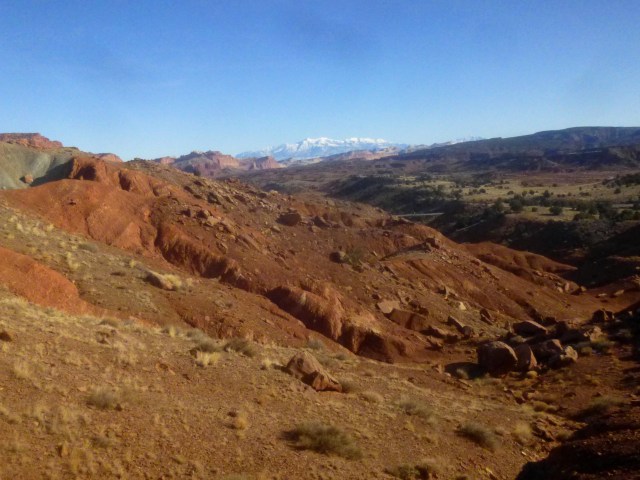 Capitol Reef and the Henry Mountains from the slopes of Cooks Mesa