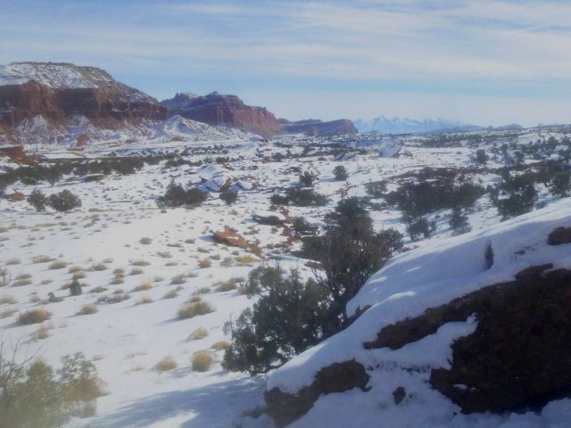 View east from Point 6,230', toward the red-orange cliff walls of Capitol Reef