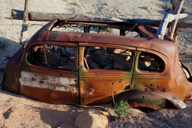 Old tourist car at the Capitol Reef park boundary in Capitol Gorge